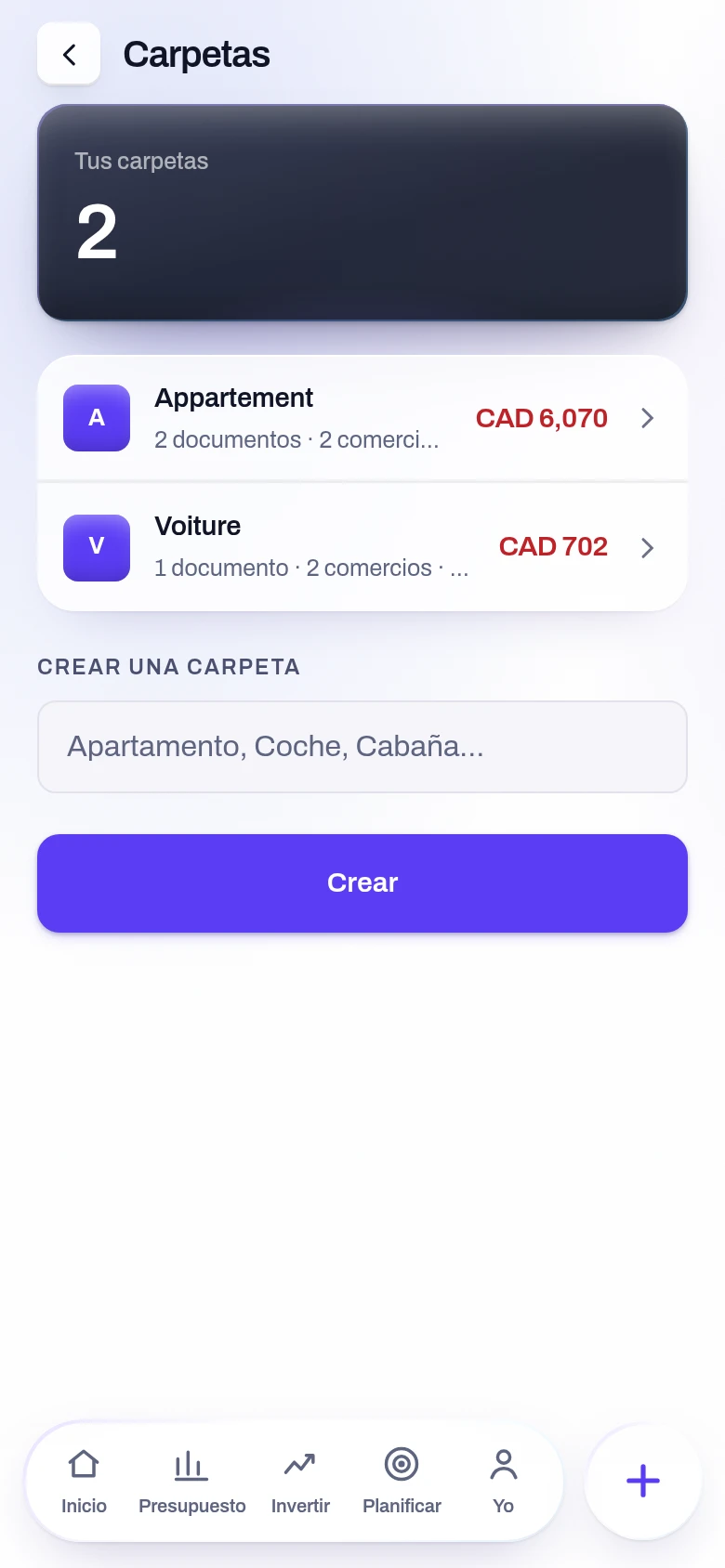 Captura de la pantalla Tus carpetas de la aplicación Yoseri. Las carpetas — el piso, el coche — con sus documentos, sus comercios y sus vencimientos, el coste total de cada una, y cómo crear una.